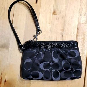Like new adorable Coach Wristlet.